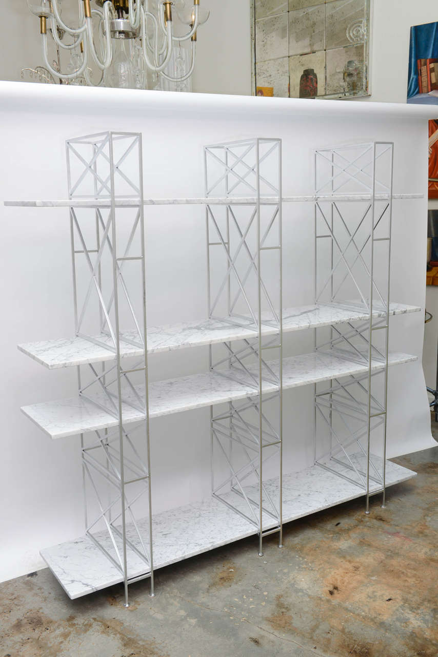 Striking and very functional iron and marble display or storage unit with four marble shelves. Great for kitchen or library.