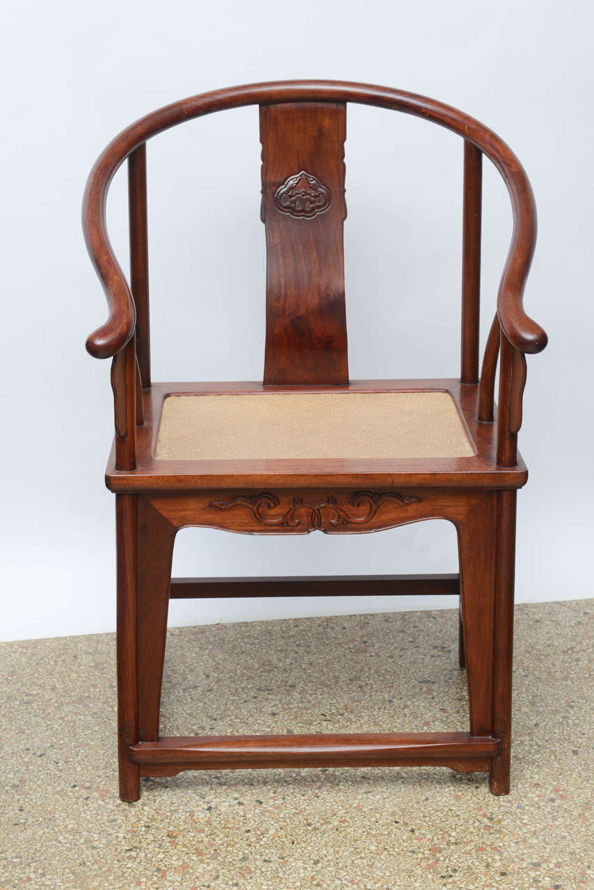 Chinese hardwood chair has a solid cane panel seat, original restored finish.

Originally $ 1,200.00