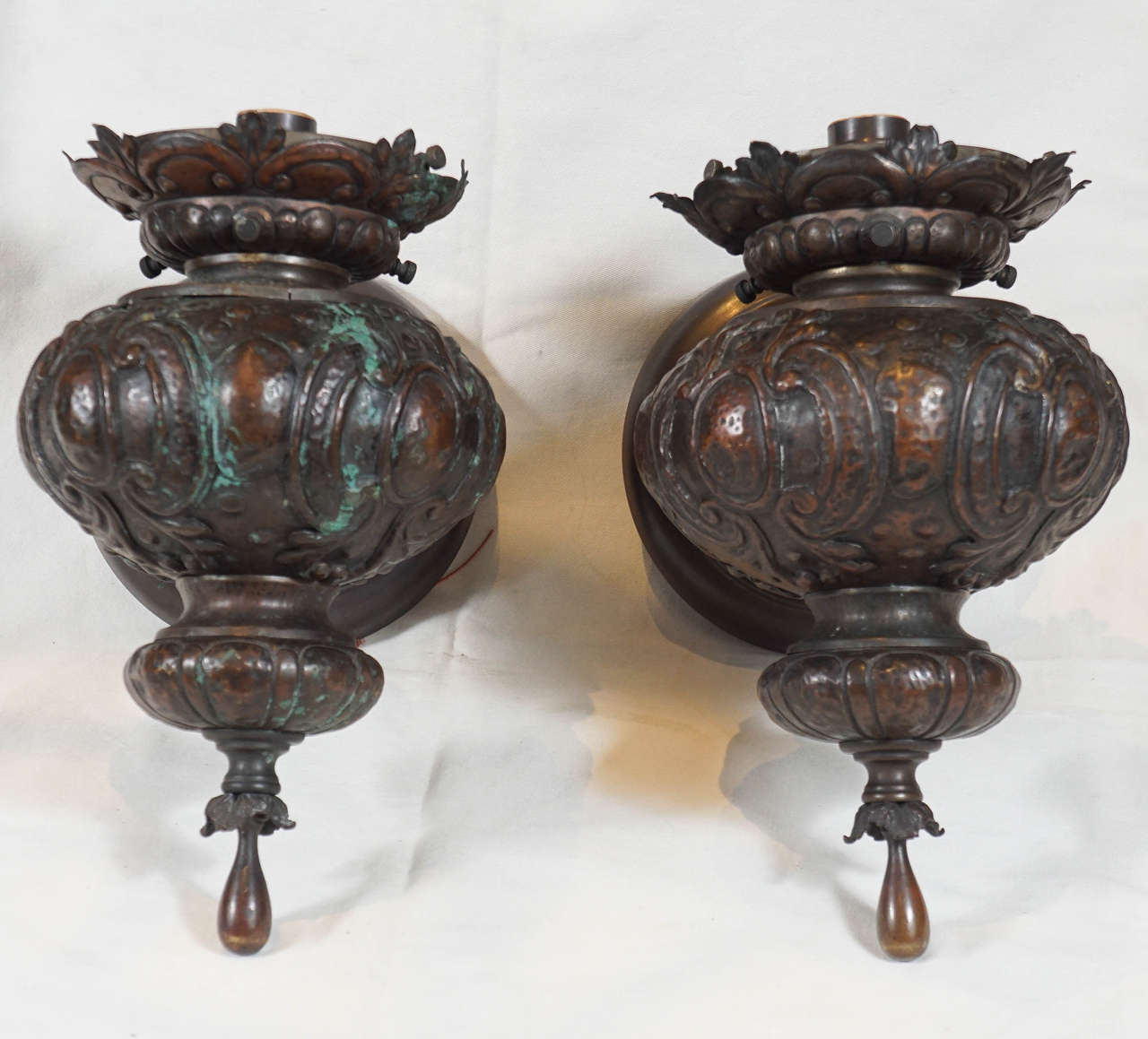 Rare early american electric sconces in the Renaissance revival style.  Beautiful form and proportion. Can take a flame shaped glass shade or a ball.