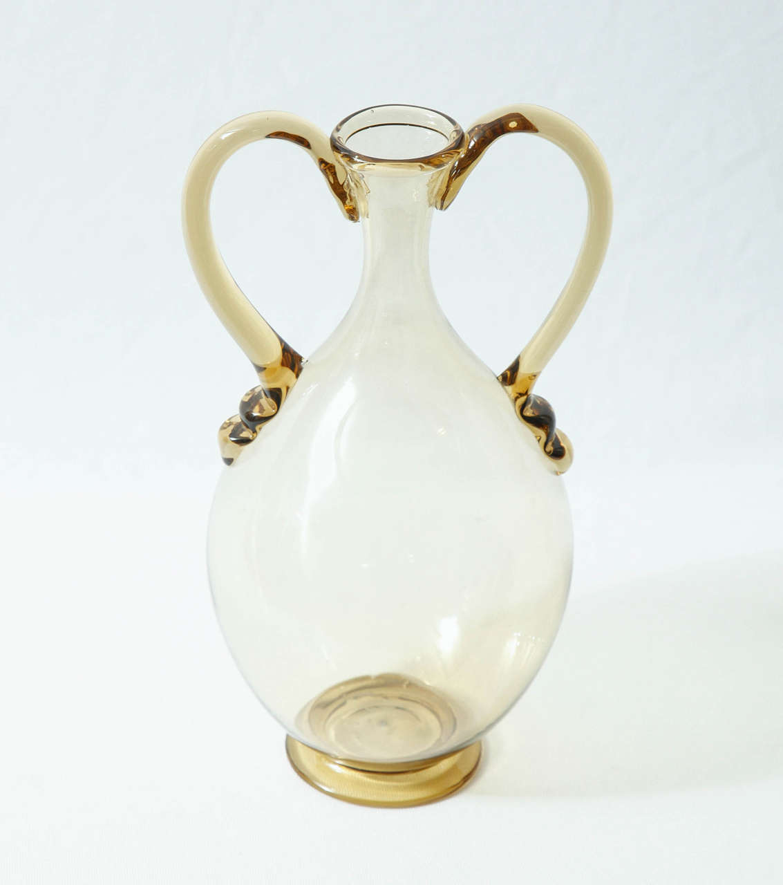 'Soffiato' vase in light yellow blown glass with applied details designed by the Italian artist Vittorio Zecchin (1878-1947) and executed by Venini, glassworks in Murano, Italy.
Venini acid marks (see last image).