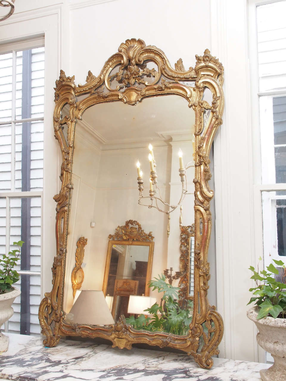 19th century Louis XV gilt mirror.