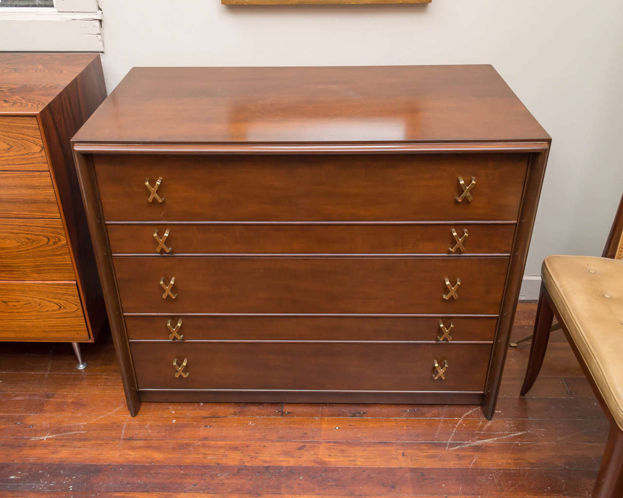 Pair of refined chests designed by Paul Frankl for Johnson Furniture, circa 1950s.
Classical styling with great scale and functionality, with five deep drawers for storage. High quality construction and perfectly refinished in dark espresso with