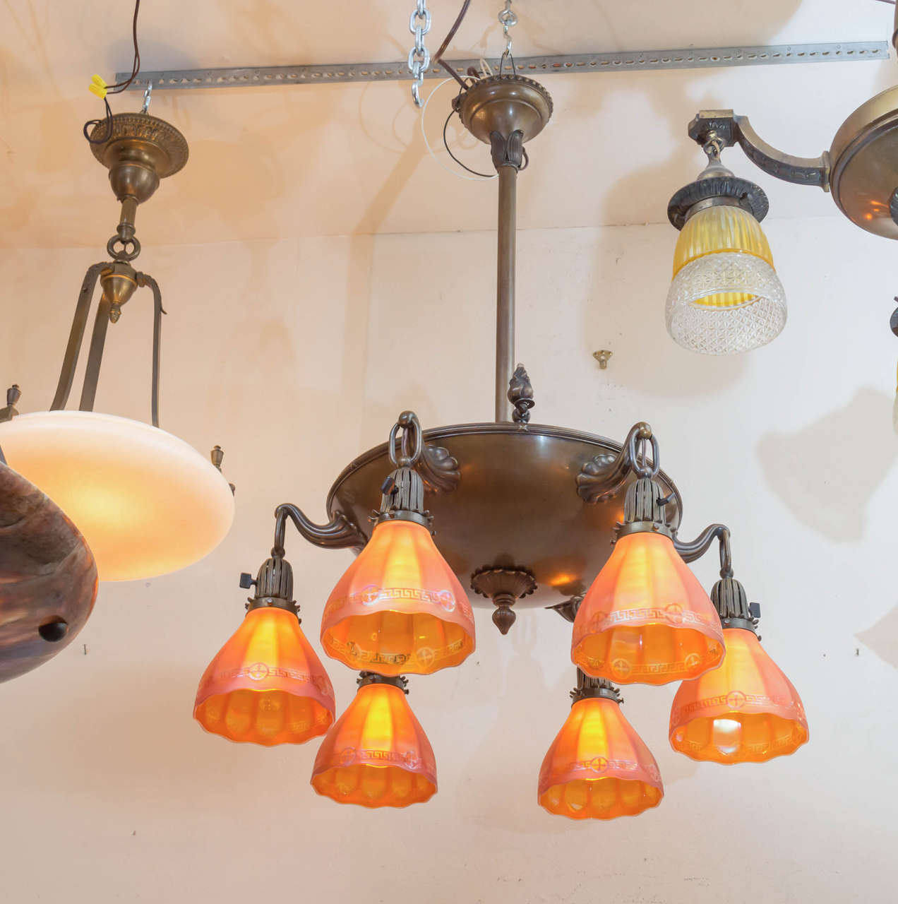 We have been antique lighting dealers for over 40 years, and we will give you an interesting look into our business. We collect period, and only period sets of glass shades. Many of our chandeliers come to us missing glass. Any serious lighting