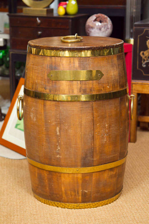 handcrafted wood and brass barrel lined to be used as a cooler.  Drainage spout at the bottom, perfect for entertaining.
