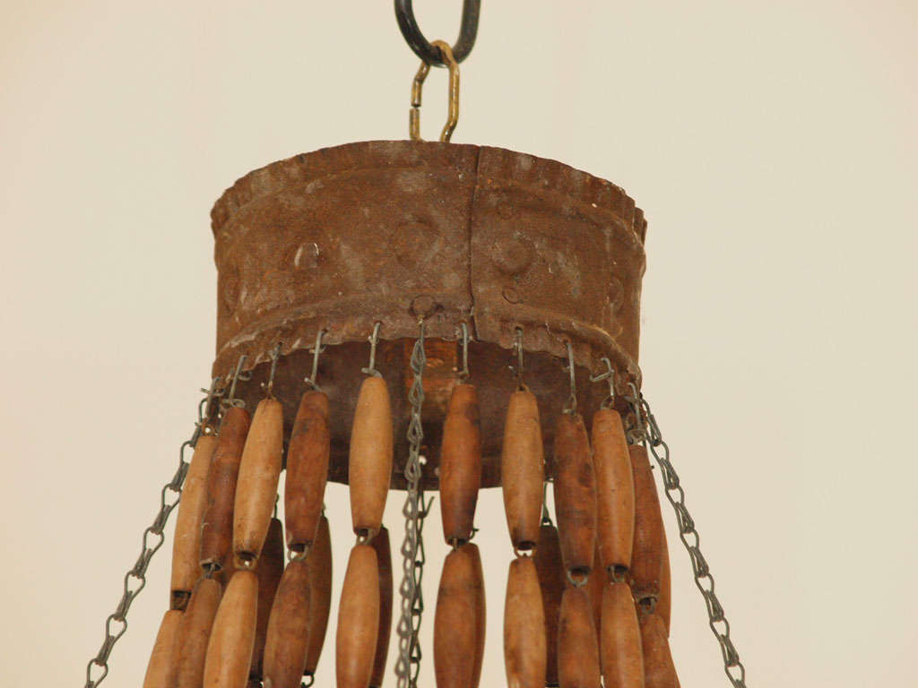 Wood French tole and wood bead chandelier For Sale