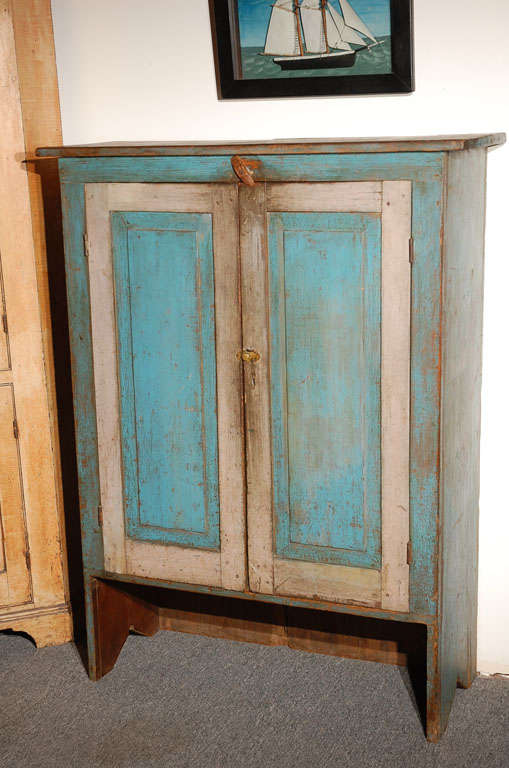 THIS ORIGINAL 19THC PAINTED ROBIN EGG BLUE JELLY CUPBOARD HAS A DUSTY ROSE PAINTED FRAMED DOORS.THE INTERIOR HAS A DUSTY ROSE WASH AND THE INTERIOR OF THE DOORS ARE ALSO TRIMMED OUT IN SAGE GREEN PAINT WITH A DUSTY ROSE WASH PANELS. THIS EARLY