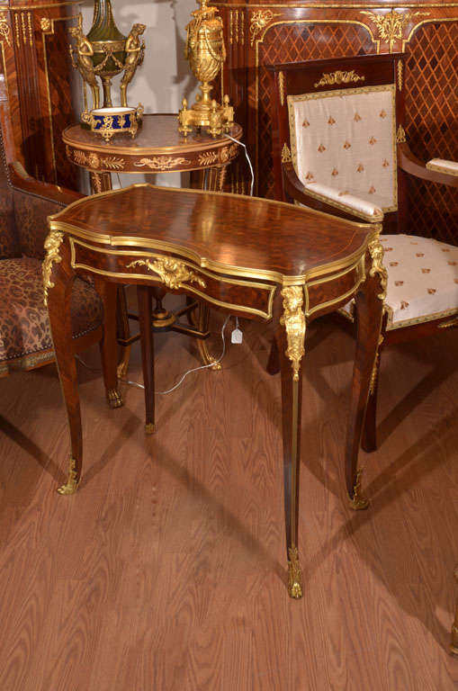 Beautiful 19th c Louis XV Kingwood side table with beautiful bronze mounts and a parquetry top . signed Sormani