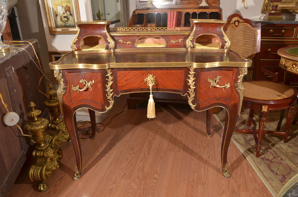 19th c French Louis XVI signed Sormani writing desk. made from Kingwood with beautiful bronze dore mounts. Leather writing surface