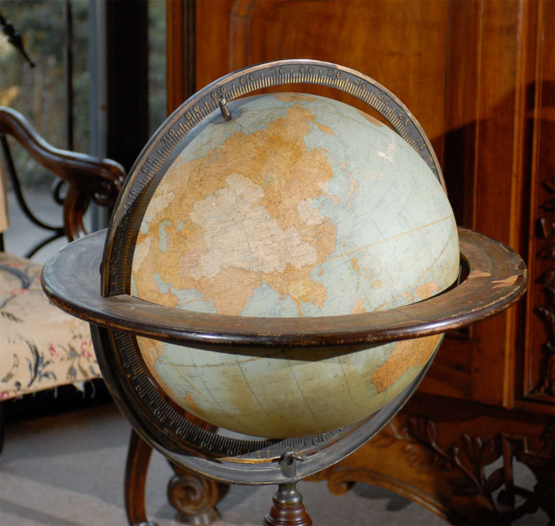A  Regency style library Terresetrial globe on mahogany tripod base with brass paw caster feet.  Made by Rand McNally & Company. 

For many more fine antiques, please visit our online gallery.

William Word Fine Antiques: Atlanta's source for
