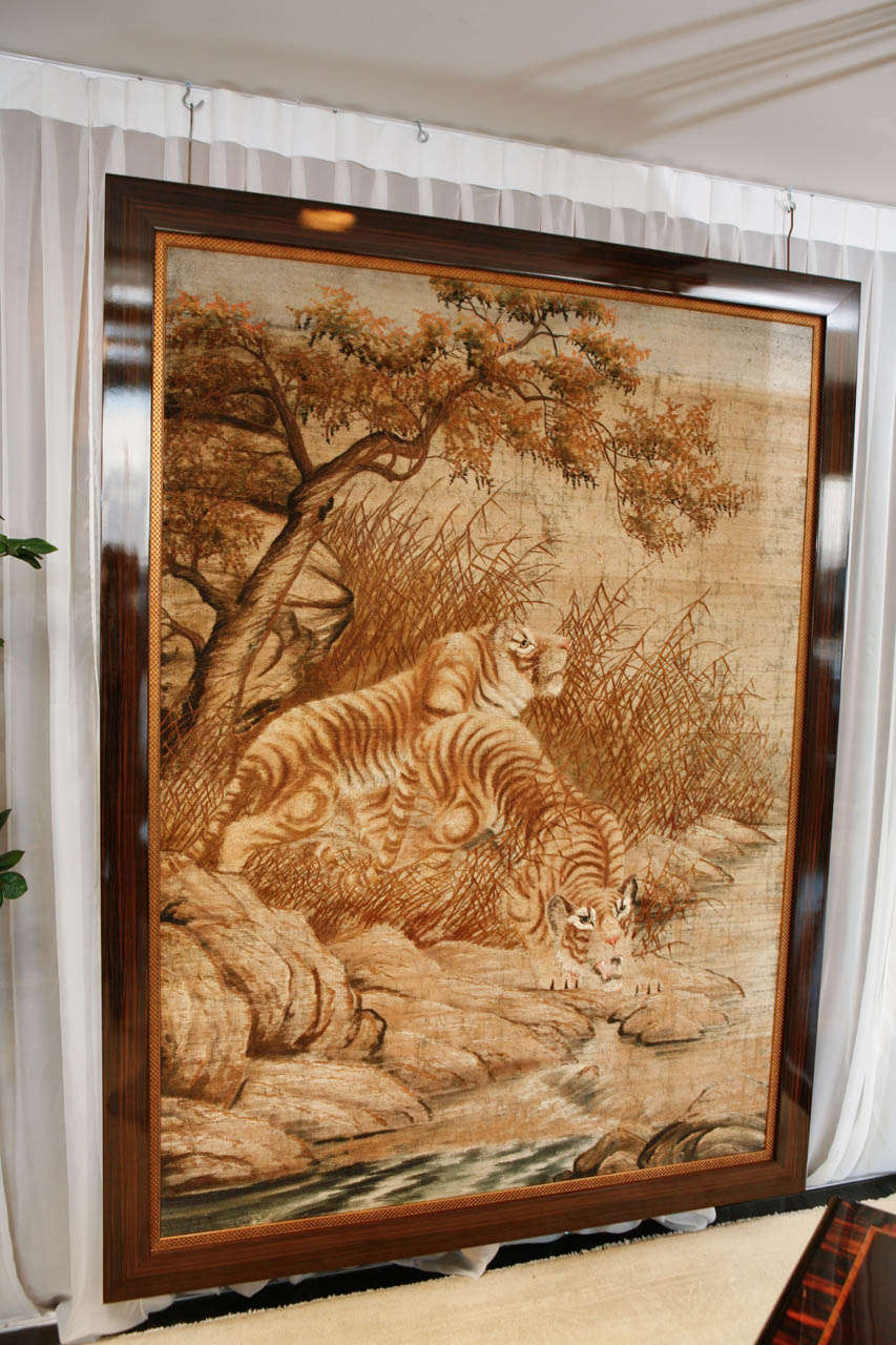 Oversized pair of tigers tapestry framed in macassar with a golden inner border. Partner tapestry depicts lion and lioness in same style and size. Sold as a pair or separately.