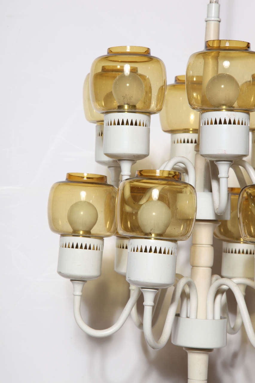 Enameled Hans Agne Jakobsson 2 Tier Off White Hanging Pendant with 12 Amber Glass Shades For Sale