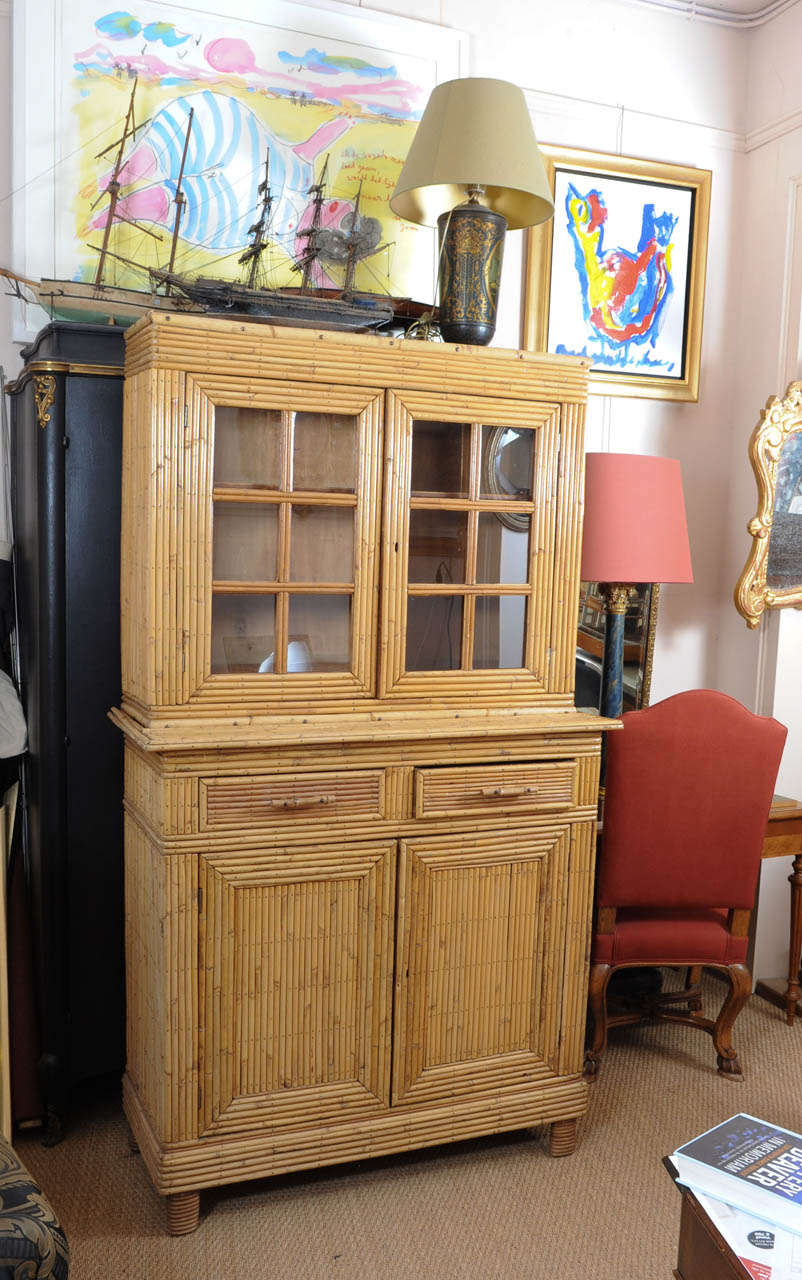 Bamboo, partly display cabinet, built up in two parts.