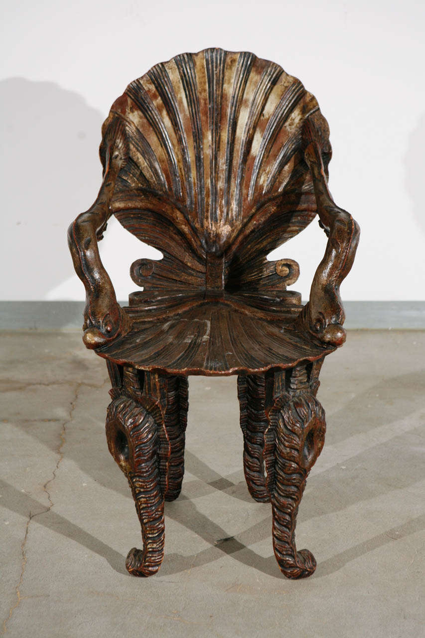 Venetian carved wood grotto chair with dolphin motif
