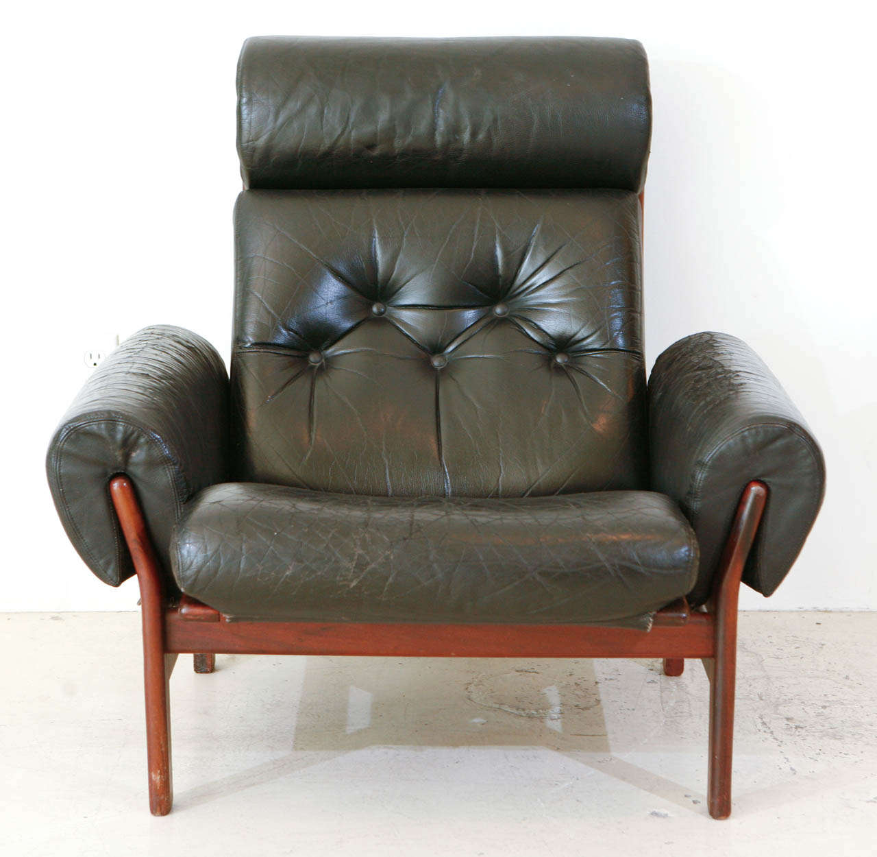 Norwegian black leather club chair.