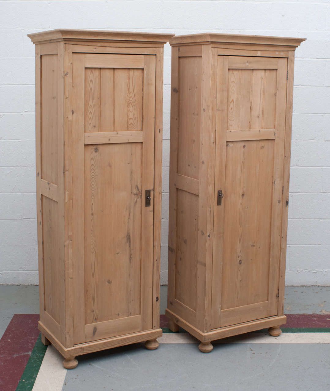 An attractive and useful pine panelled chimney cupboard with hand-carved beadboard to the upper door panel and three interior shelves.  Now only one available.
