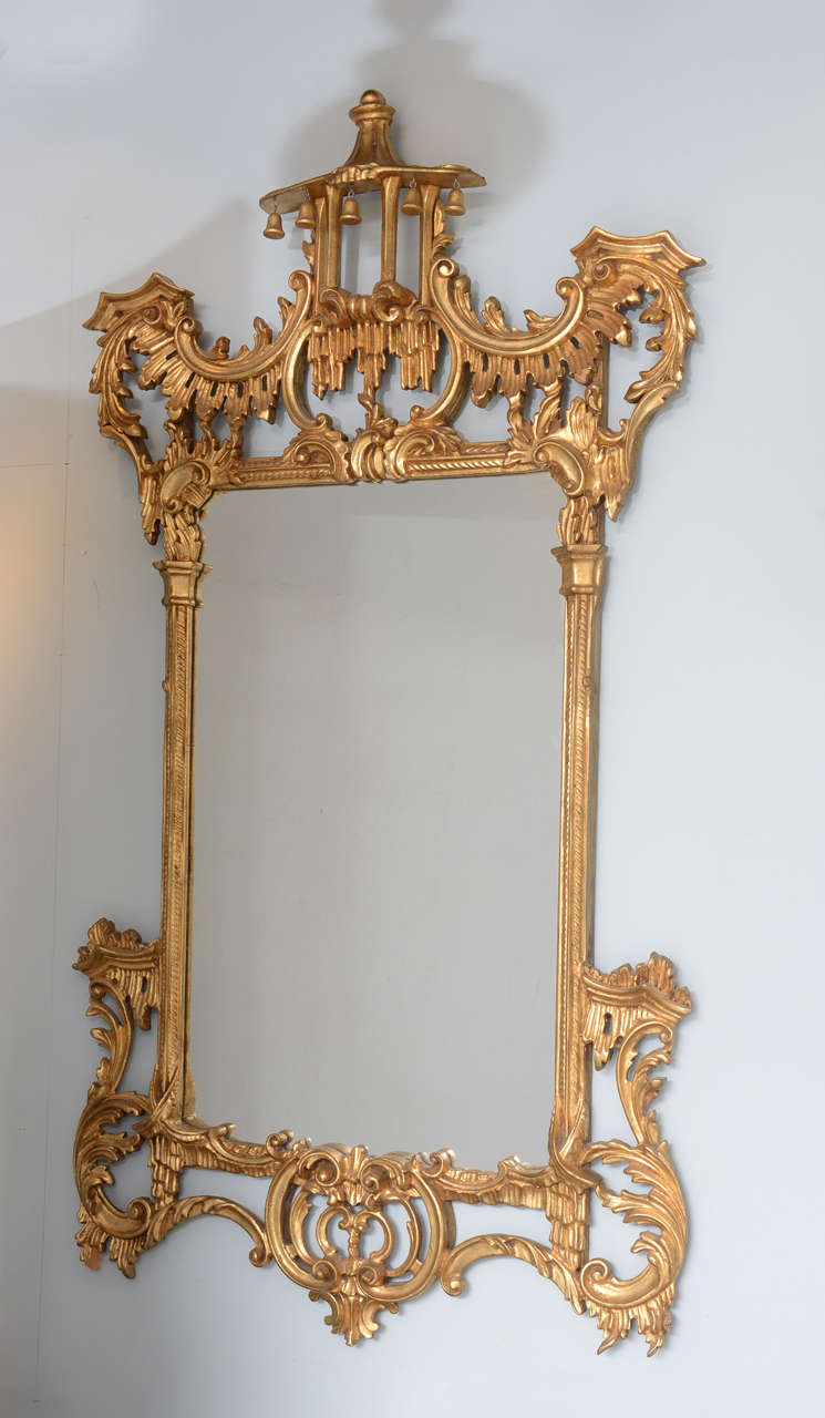 Stunning George III style delicate, gilt mirror, elaborate carving details.
this mirror can dominate a large wall do to its  size and elegance