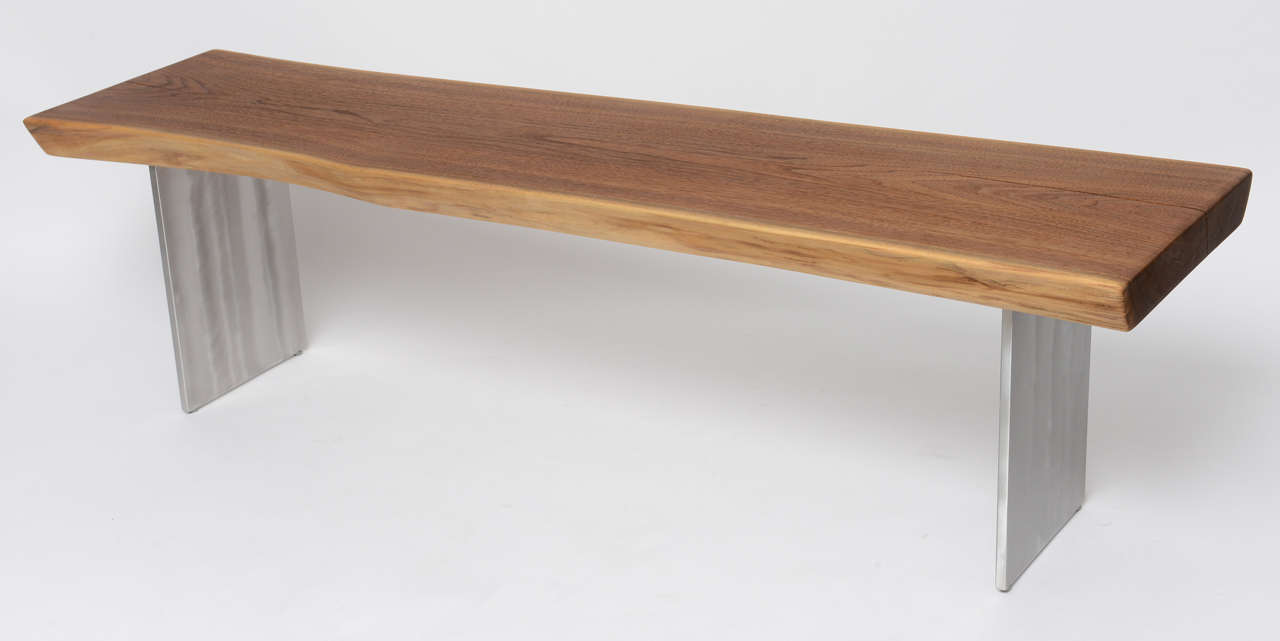 One of its kind, Artisan, black walnut bench, handmade aluminium legs.
originally was $4900.00
SIGNED by the artist
