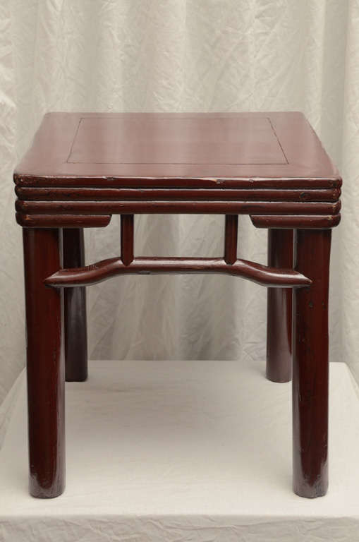 Mid-late 19th century Q'ing dynasty red lacquered round leg stool with reeded apron (one available.)