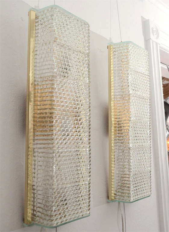 Mid-Century Modern Pair of Large Brass and Textured Glass Sconces For Sale