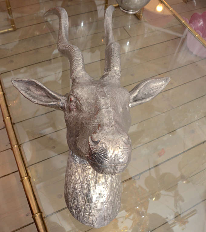 Cast aluminium African Kudu wall sculpture done in a realistic textured manner.
