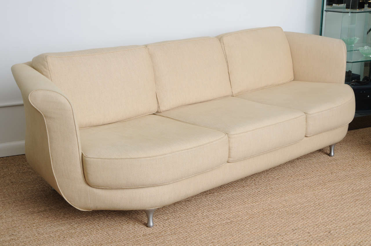 Very comfortable, deep seated sofa by Moroso. The legs are brushed steel and easily refinished to another color.