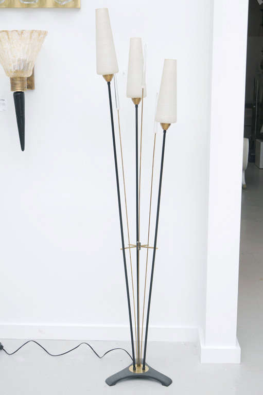 French Mid-Century Modern standing lamp with enamel iron structure and brass details with white glass globes. The fixture has been professionally rewired to meet US standards.