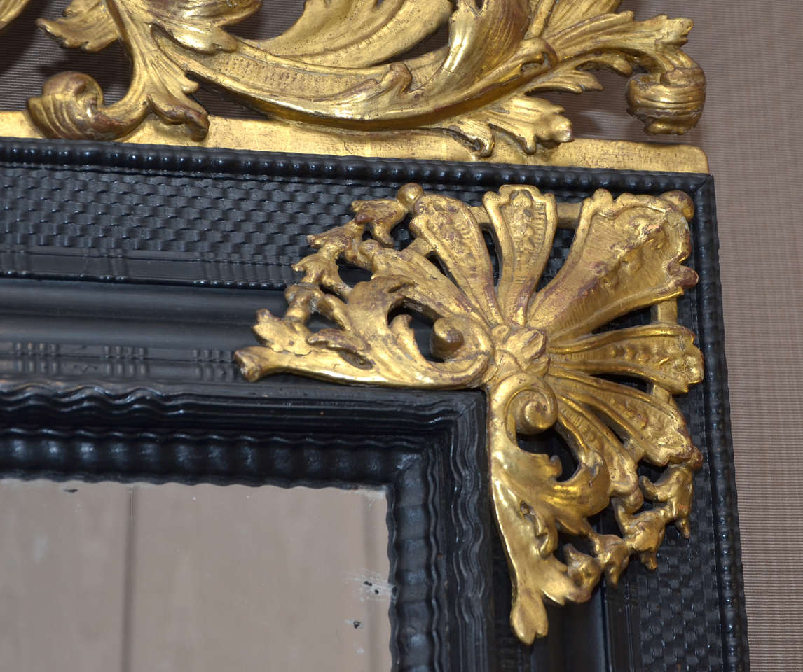 A Louis XIV Gilded & Ebonised Mirror 1