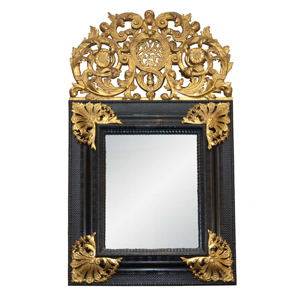 A Louis XIV Gilded & Ebonised Mirror