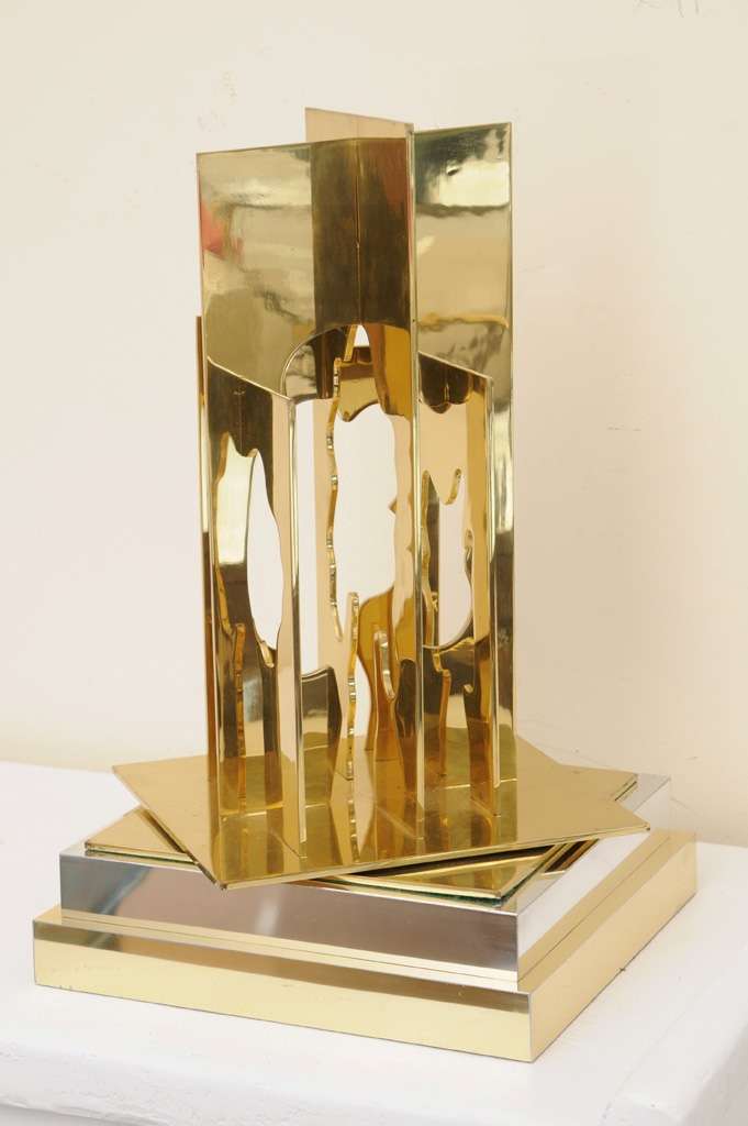 Brass Pivotal Sculture entitled "Continum" by Menashe Kadishman