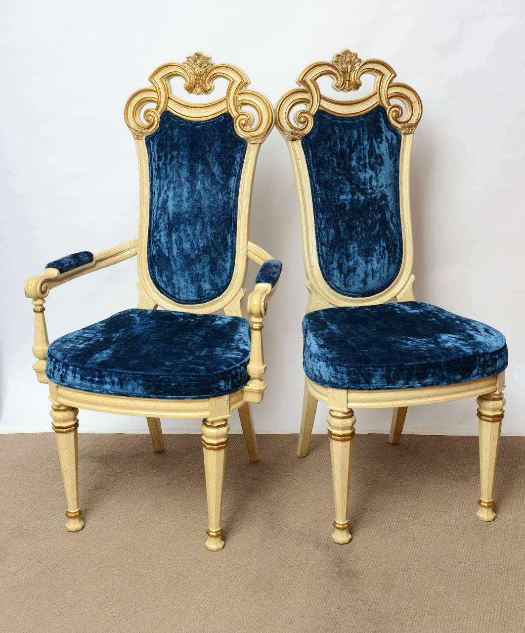 This 10 Hollywood regency venetian carved high back dining Chairs are in very nice vintage condition. The original blue royal velvet is in perfect condition that bring more glam on the pieces . The chairs are coming from one of the Miami Mansion and