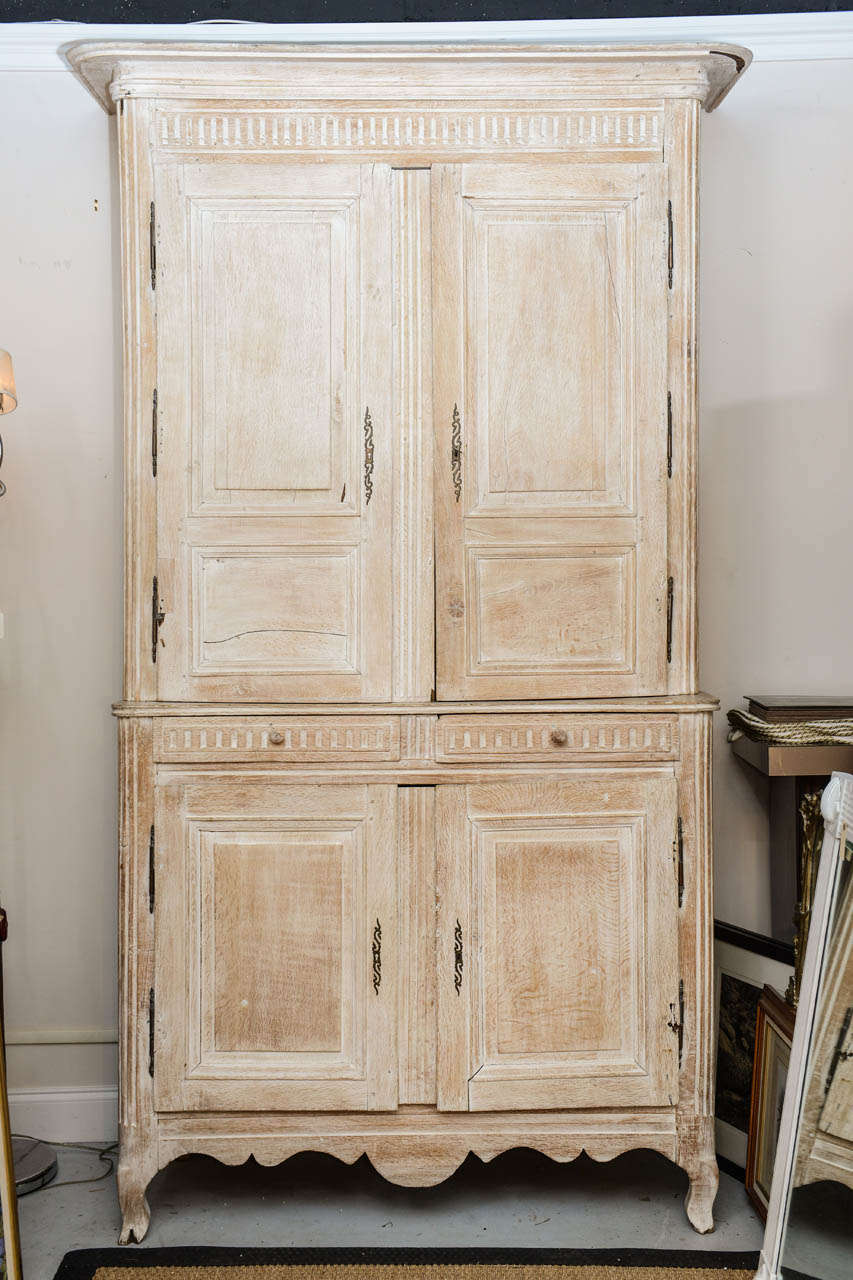 Wonderful Original Louis XV French Armoire. The top part and Bonnet are removable .
Fitted with 2 drawers and Bronze hardware.
The top part is16