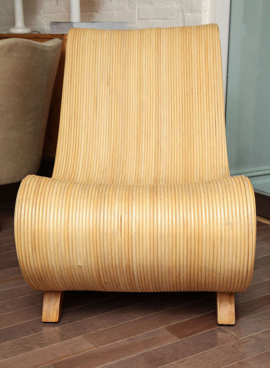 Modern style lounge chair made from heated and bent bamboo