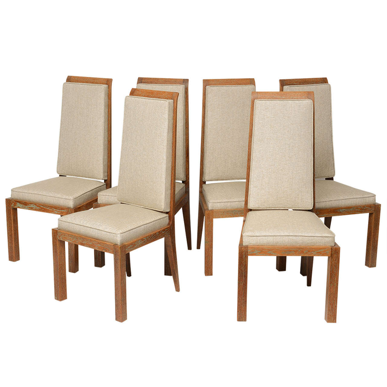 Set of six Art Deco chairs, perfectly refinished, in cerused oak, refined and elegant proportions.
The shape is refined, the back feet are designed following an oblique line.
Very high-end cubist design, these chairs are made of solid cerused oak,