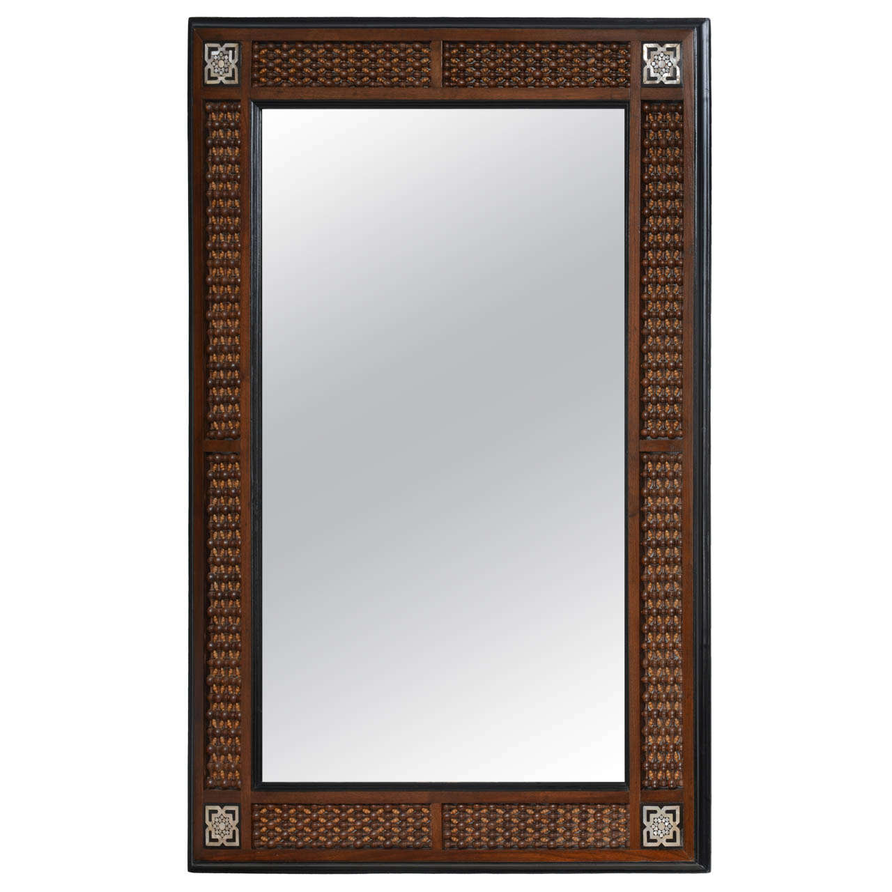 Miroir oriental en bois sculpté