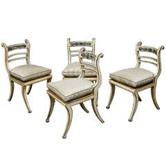 A Set of Four English Regency Chairs with Cane Seats and New Cushions