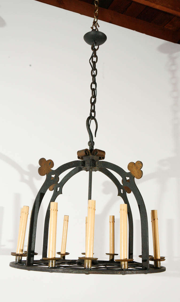 French iron chandelier with brass bobeches; newly wired for twelve candelabra sockets, each up to 60 watts.