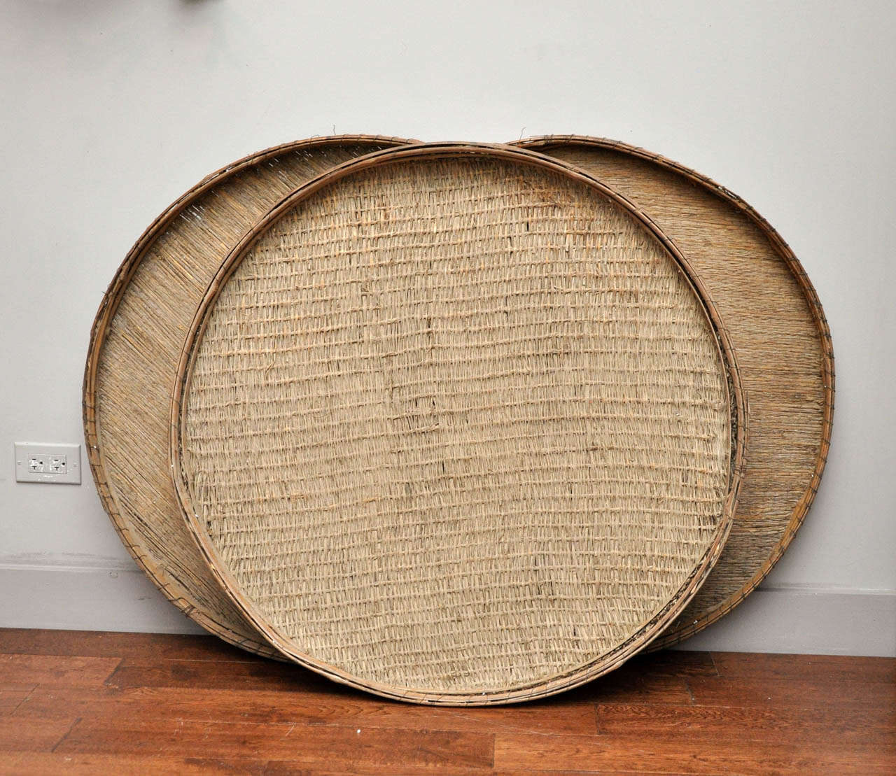 Items are antique bamboo straining baskets used during the preparation and serving of Japanese cuisine. Sold as a collection of three.