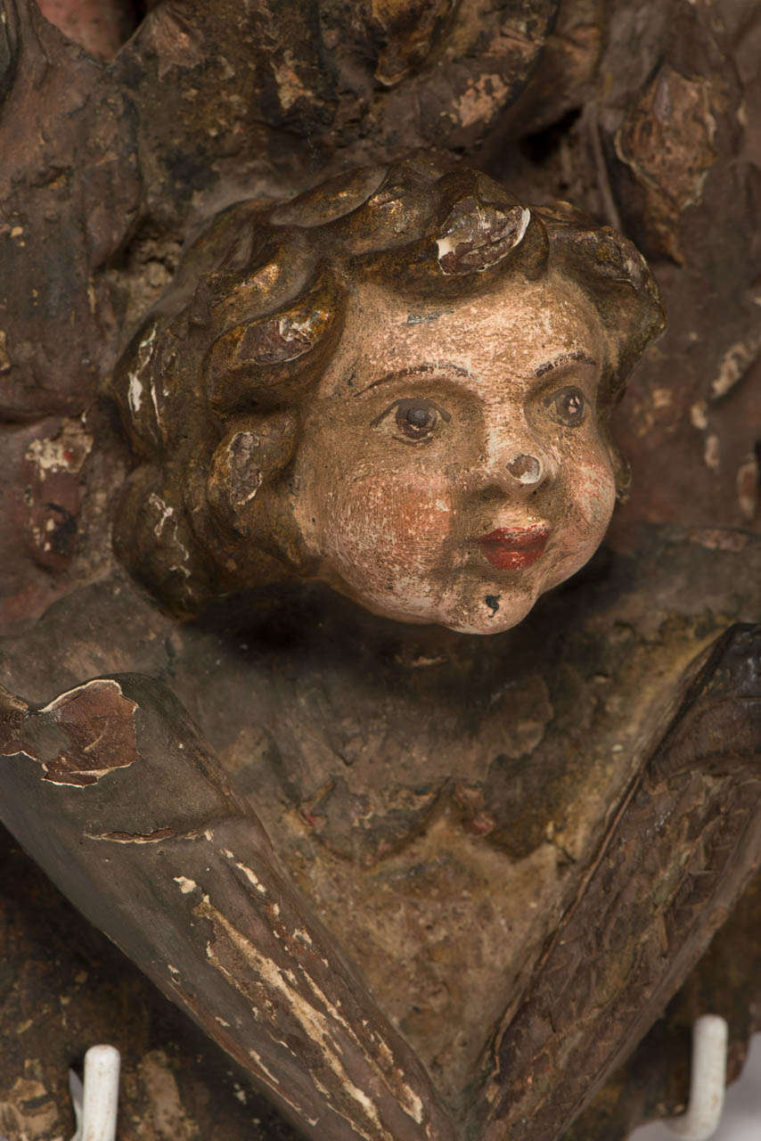 Carved Polychrome Woodcarving with Putti Head For Sale