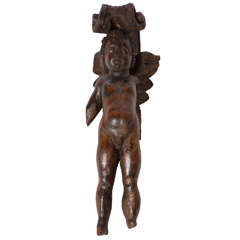 Lime wood carving of putti