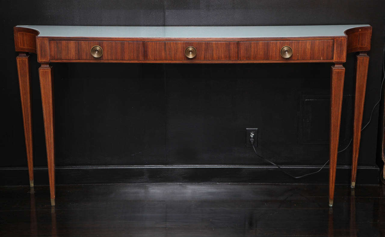 Three drawer Paolo Buffa Regency-style console table with inset glass top.