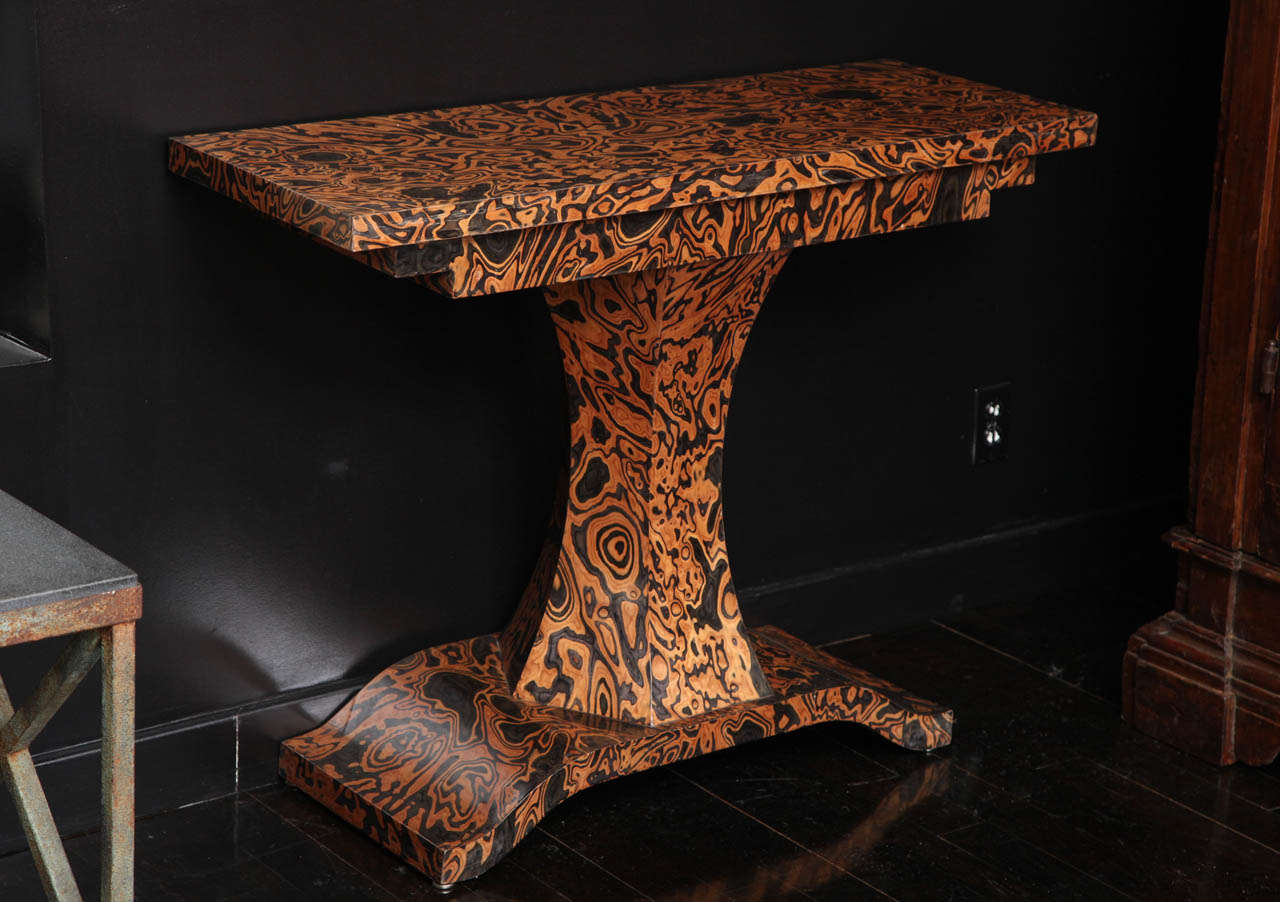 A fabulously sexy Zebra wood console with incredible details and a striking presence in any room. Finished on both sides making it perfect to float behind a sofa.