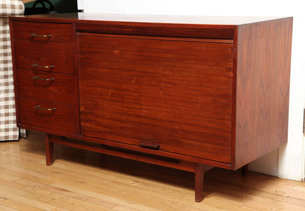 Jens Risom Danish/American  Walnut Sideboard. Circa 1960. with Brass handles.