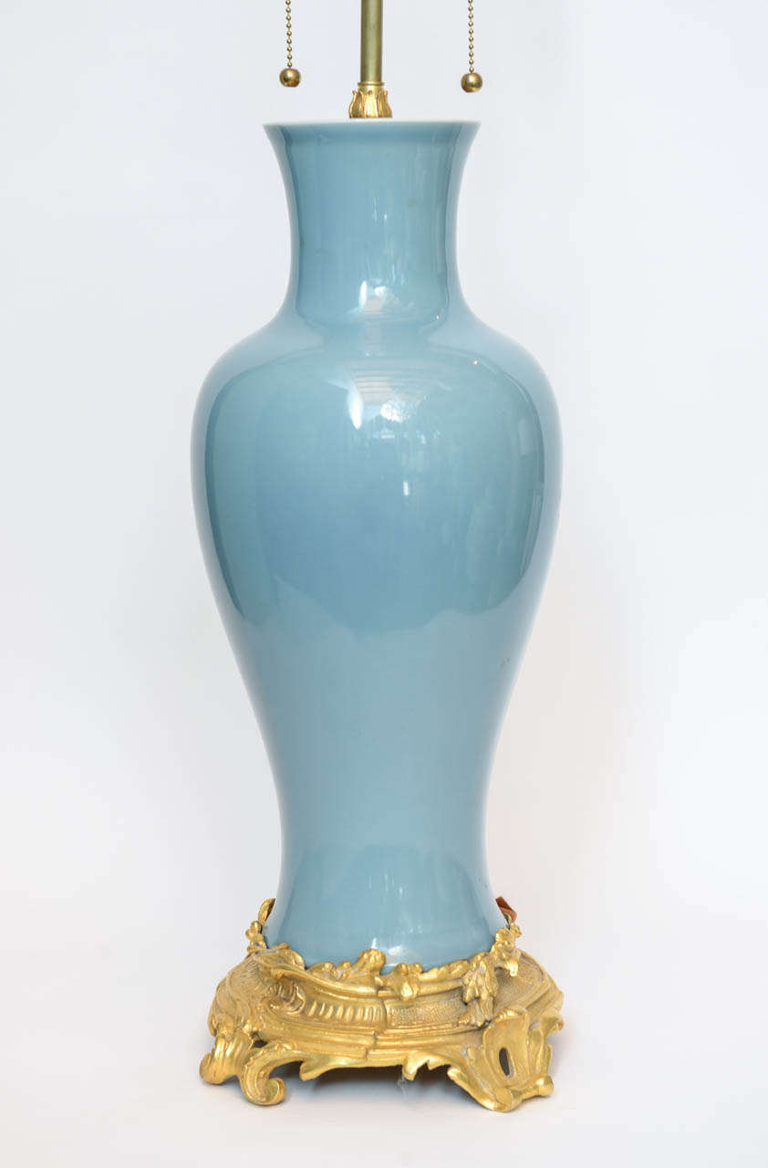 Pair of Powder Blue Glazed Chinese Porcelain Bronze Base Mounted Lamps In Excellent Condition In Palm Beach, FL