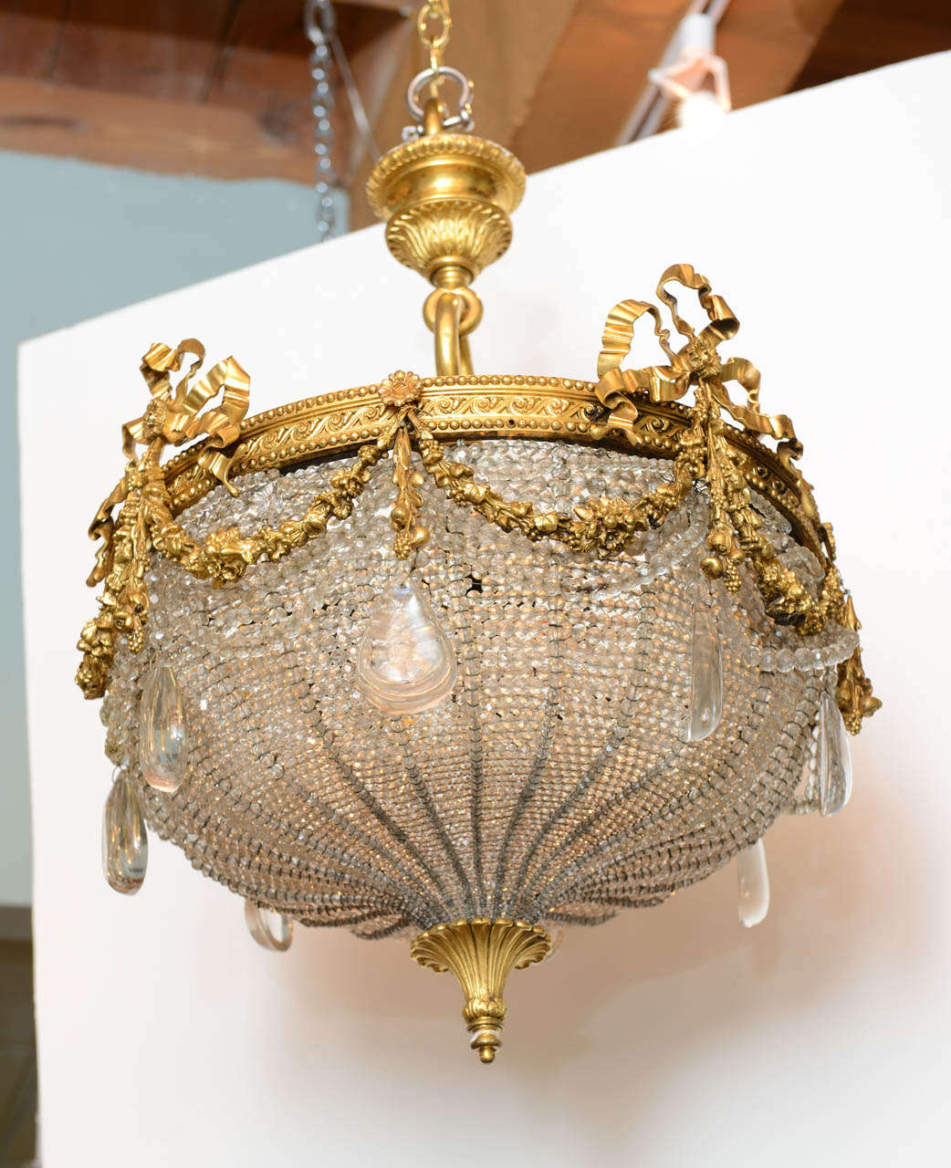 20th Century A Beautiful Gilt Bronze Ribboned and Wreath Beaded Chandelier by E. F. Caldwell