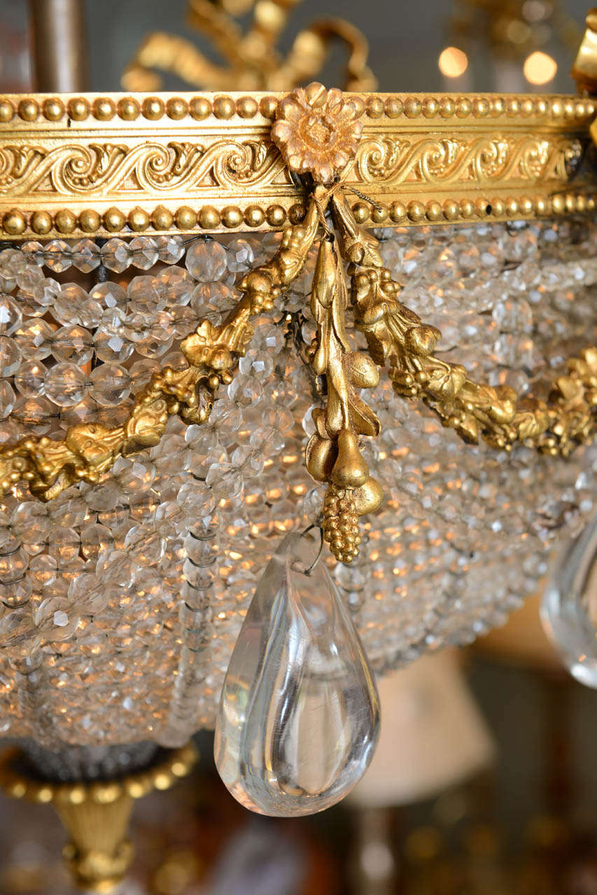 A Beautiful Gilt Bronze Ribboned and Wreath Beaded Chandelier by E. F. Caldwell 2