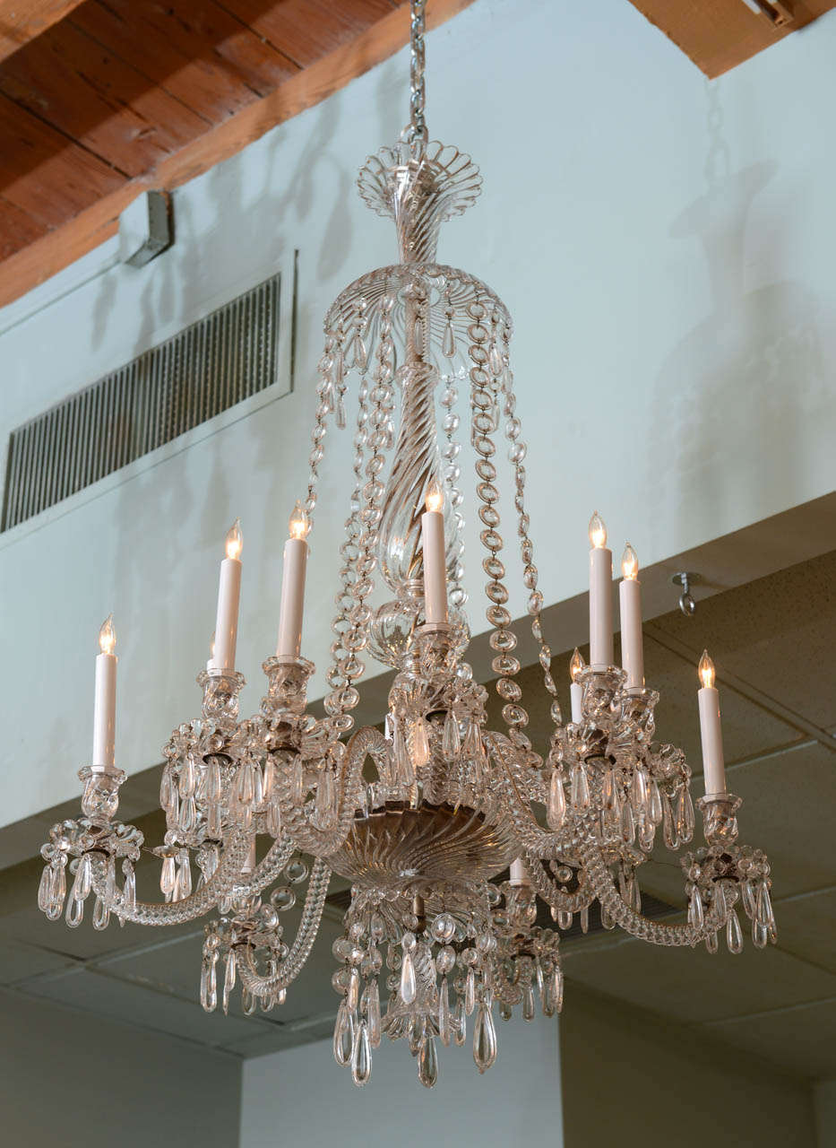 A clear crystal 12 branch Baccarat chandelier stamped Baccarat 
Circa 1900