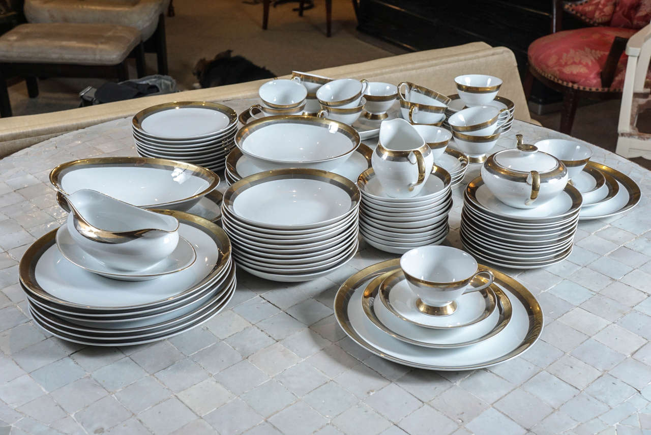 Here is an elegant porcelain China service with a two toned gold trim.
The design is Royal M by Meito and is a full service for 12.
The dinner plates are 10.5 inches diameter.