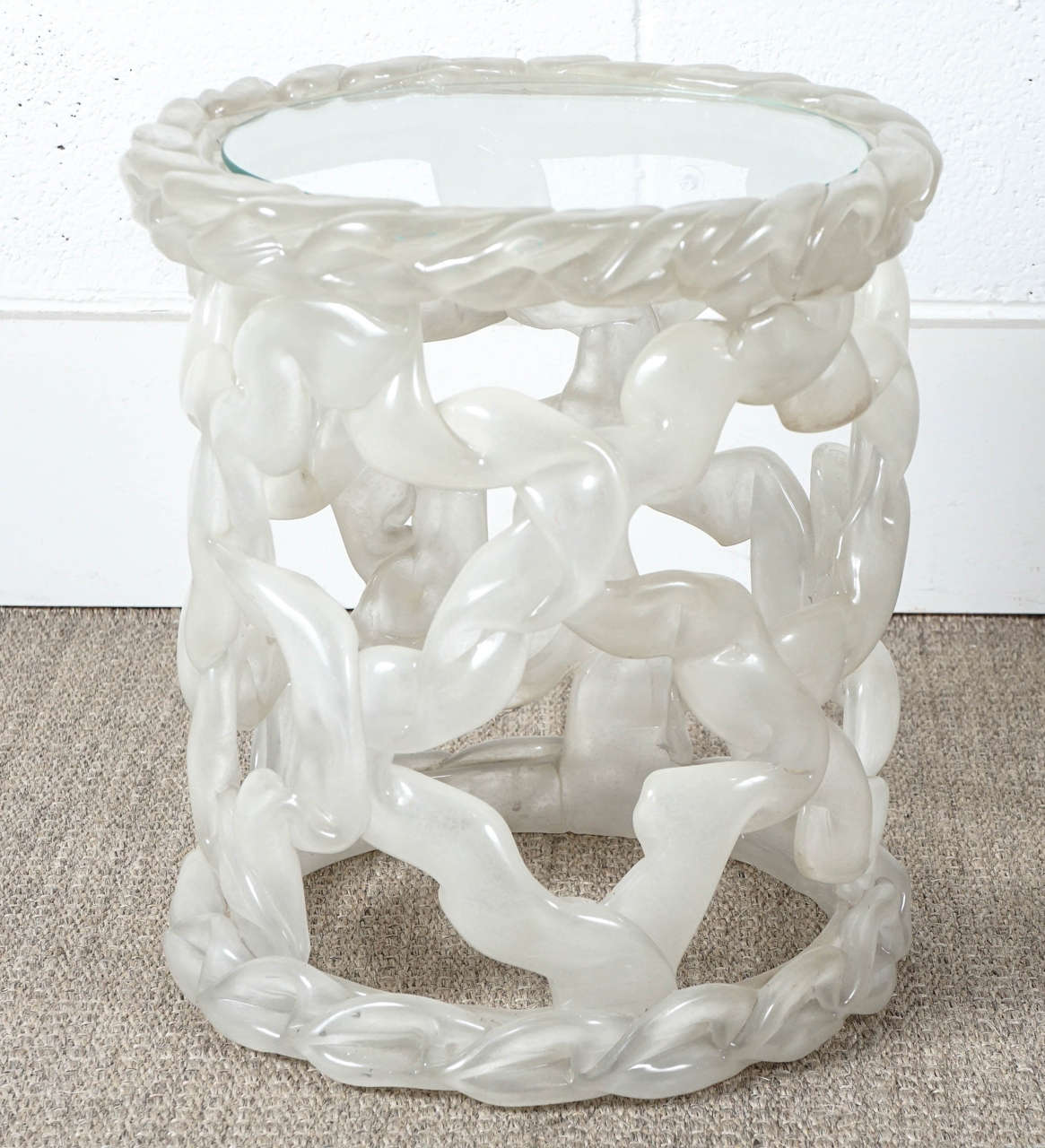 Here is a beautiful Tony Duquette ribbon table in white acrylic.