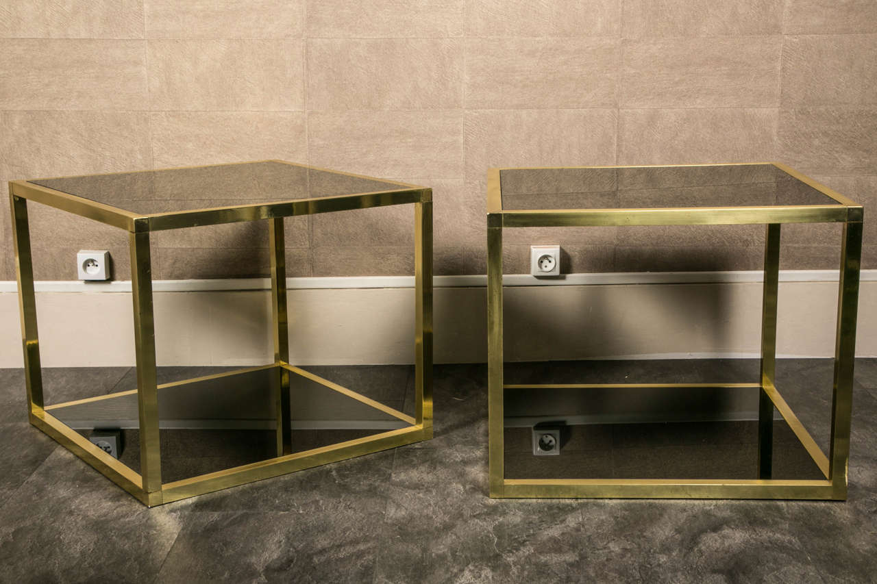 Pair of Italian brass side tables with black opaline glass tops. 
Attribuited to Romeo Rega