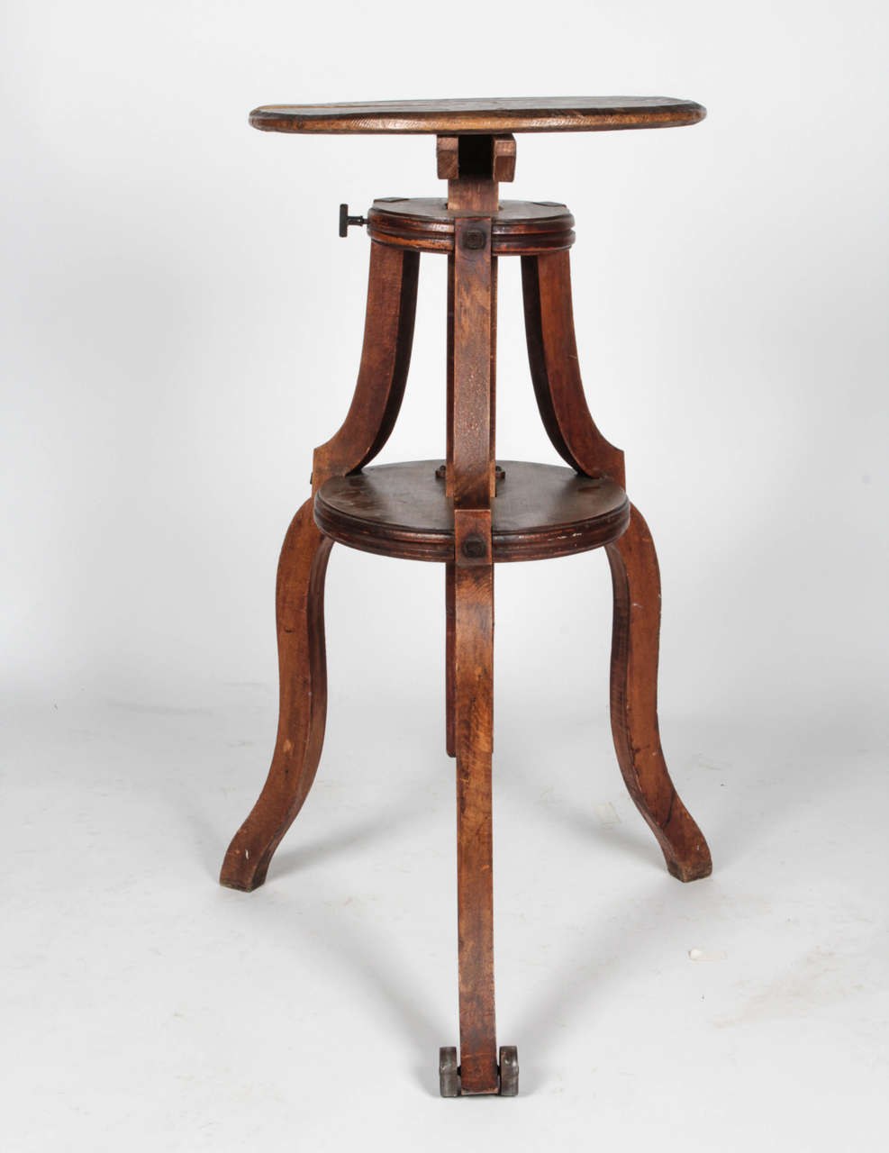 Wood pedestal that is adjustable in height. Has a single wheel for ease of moving piece.

*Not available for sale or to ship in the state of California.